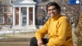 Pranay Karkale, a first-year graduate student at Johns Hopkins University from Nashik, India, stands at the university's campus in Baltimore on Sunday, Feb. 18, 2024. (AP Photo/Steve Ruark)