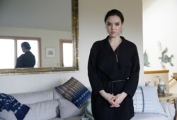 In this photo taken Tuesday, Feb. 21, 2017, Erin Schrode poses at her home in Mill Valley, California.