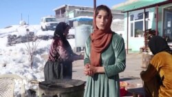 ڕۆژێک لە گوند لە نێو بەفر و زستاندا