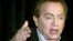 FILE- In this Aug. 28, 2002, photo, comic Jackie Mason addresses the media at a comedy club in Chicago. 