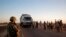 French soldiers search people at a checkpoint on the outskirts of Gao, Mali, February 14, 2013. 