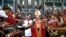 Pope Francis arrives to leads a Mass at St Mary's Cathedral in Yangon