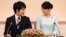 Princess Mako, the elder daughter of Prince Akishino and Princess Kiko, and her fiancee Kei Komuro, a university friend of Princess Mako, smile during a press conference to announce their engagement at Akasaka East Residence in Tokyo, Japan, Sept. 3, 2017.