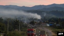တရုတ္-ျမန္မာနယ္စပ္ လမ္းပိုင္းတနေရာ (ဓာတ္ပံု- AFP)