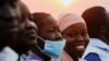 FILE - People wait to celebrate the holy mass by Pope Francis at John Garang Mausoleum during his apostolic journey in Juba, South Sudan, Feb. 5, 2023.