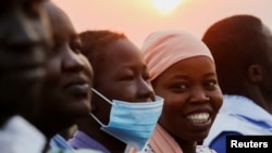 FILE - People wait to celebrate the holy mass by Pope Francis at John Garang Mausoleum during his apostolic journey in Juba, South Sudan, Feb. 5, 2023.