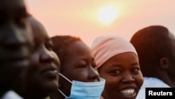 FILE - People wait to celebrate the holy mass by Pope Francis at John Garang Mausoleum during his apostolic journey, in Juba, South Sudan, February 5, 2023.