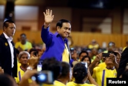 Thailand's Prime Minister Prayut Chan-o-cha arrives to deliver a keynote speech at the opening ceremony of "National Fund to Reduce Inequalities" ahead of the general election, in Bangkok, Thailand, March 18, 2019.