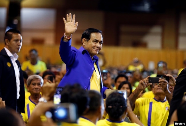 Thailand's Prime Minister Prayut Chan-o-cha arrives to deliver a keynote speech at the opening ceremony of "National Fund to Reduce Inequalities" ahead of the general election, in Bangkok, Thailand, March 18, 2019.