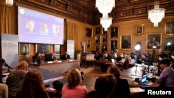 Goran K Hansson, Secretary-General of the Royal Swedish Academy of Sciences, and academy members, announce the winners of the 2019 Nobel Prize in Chemistry, Oct. 9, 2019.