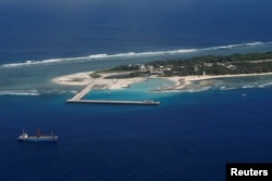 FILE - An aerial view shows Itu Aba, which the Taiwanese call Taiping, in the South China Sea.