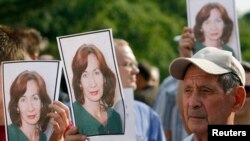 На акции протеста в день убийства Натальи Эстемировой в Москве. 16 июля 2009 г.