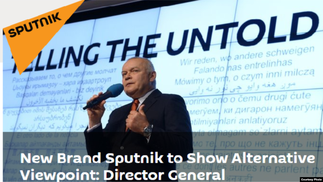 Dmitry Kiselev is seen at the announcement of the creation of the new media brand, Sputnik, in this screengrab from the Sputnik website.