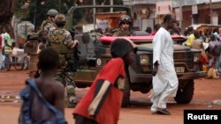 French soldiers patrol in the streets in Bangui, Central African Republic on Dec. 13, 2013. 