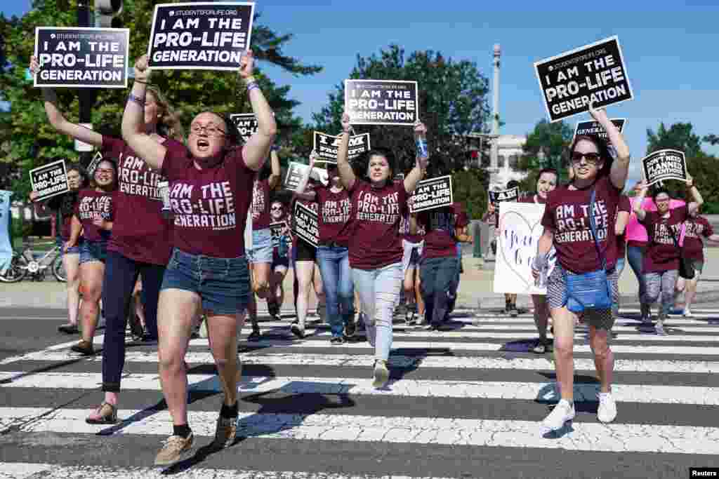 Pro-life protesters rally outside the U.S. Supreme Court waiting for the National Institute of Family and Life Advocates v. Becerra case, which remains pending, in Washington.