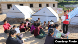 지난 2018년10월 북한 강원도 문천에서 적십자 자원봉사자가 주민들에게 보건 교육을 하고 있다. (사진제공: 국제적십자위원회)