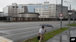 A man walks past the building of the Russian military intelligence service in Moscow, Russia, July 14, 2018. 