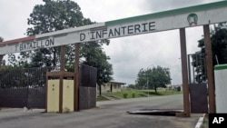 The entrance to an army base camp that was the scene of recent fighting in Abidjan, Ivory Coast, August 6, 2012. 