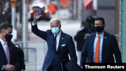 U.S. President-elect Joe Biden leaves a historic theater after participating in a virtual meeting on national security in Wilmington, Delaware, November 17, 2020.