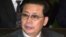 Jang Song-Taek is seen during a meeting in Seoul, 26 October 2002. 
