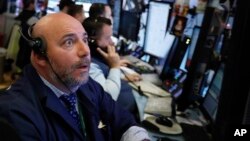 Trader Vincent Napolitano works on the floor of the New York Stock Exchange, Dec. 3, 2018. 
