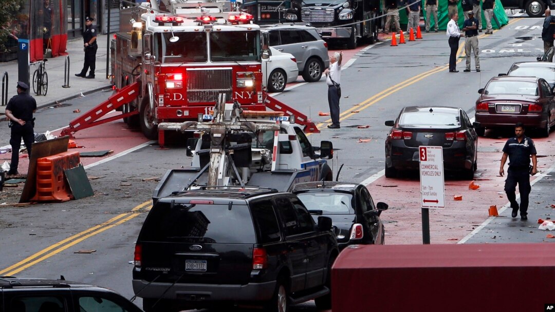Emergency personnel work at the scene of Saturday's explosion on West 23rd Street in Manhattan's Chelsea neighborhood in New York, Sept. 19, 2016. 