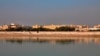 FILE - In this Jan. 3, 2020 file photo, the U.S. Embassy is seen from across the Tigris River in Baghdad, Iraq. Three rockets hit Baghdad on Feb. 22, 2021, with two of them landing in the Green Zone.