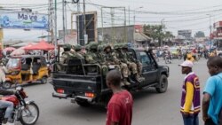 Sebuah truk pikap yang mengangkut tentara pemberontak M23 melaju di jalan di Goma, provinsi Kivu Utara, Republik Demokratik Kongo (4/2). Pemberontak M23 kini menguasai wilayah Kongo timur.