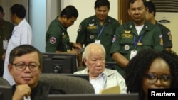 FILE - Former Khmer Rouge head of state Khieu Samphan sits at the courtroom of the Extraordinary Chambers in the Courts of Cambodia (ECCC) as he awaits a verdict, on the outskirts of Phnom Penh, Cambodia, Nov. 16, 2018. (ECCC's handout via Reuters)