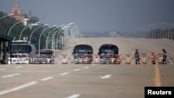 Police checkpoint is seen on the way to the congress compound ahead of the new parliament opening in Naypyitaw, Myanmar, Jan. 30, 2021.