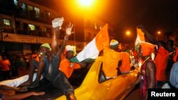 Des supporters ivoiriens dans Abidjan, 8 février 2015. 