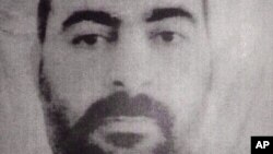 FILE - The official website of Iraq's Interior Ministry claims to show Abu Bakr al-Baghdadi, the head of the so called Islamic State of Iraq and the Levant. 