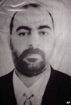 FILE - The official website of Iraq's Interior Ministry claims to show Abu Bakr al-Baghdadi, the head of the so called Islamic State of Iraq and the Levant.