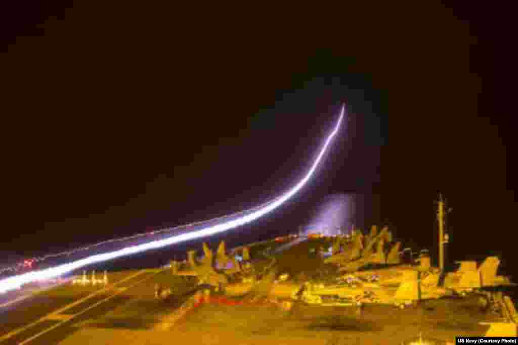 An EA-18G Growler from the Shadowhawks of Electronic Attack Squadron (VAQ) 141 takes off from the flight deck of the aircraft carrier USS George Washington, Sept. 20, 2014.