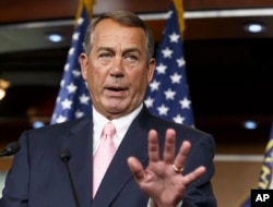 Speaker of the House John Boehner talks with reporters about the border crisis, veterans' health care, and future funding, on Capitol Hill, July 24, 2014.