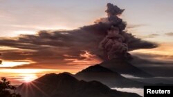 Mount Agung volcano spews smoke and ash in Bali, Indonesia, Nov. 26, 2017.
