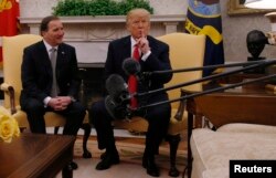 U.S. President Donald Trump meets with Sweden's Prime Minister Stefan Lofven, left, in the Oval Office at the White House in Washington, March 6, 2018.