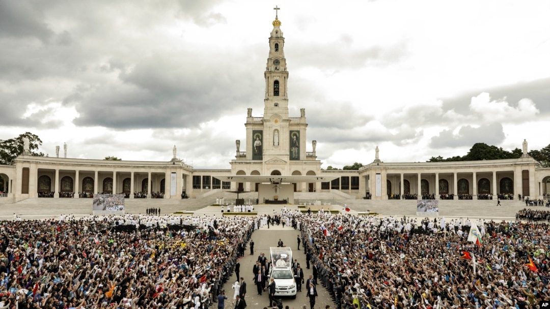 FILE - Pope Francis departs Mass at which he canonized shepherd children Jacinta and Francisco Marto at the Sanctuary of Our Lady of Fatima, May 13, 2017, in Fatima, Portugal.