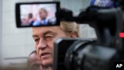 Geert Wilders, leader of the Freedom Party, known as PVV, speaks to reporters after casting his ballot in The Hague, Netherlands, on Nov. 22, 2023.