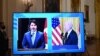 Presiden AS Joe Biden (kanan) dan Perdana Menteri Kanada Justin Trudeau memberikan keterangan kepada media melalui layar televisi, seusai pertemuan bilateral virtual di Ruang Timur Gedung Putih, 23 Februari 2021.