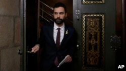 Roger Torrent, speaker of Catalan Parliament, arrives for a statement at the Catalonia Parliament in Barcelona, Spain, Jan. 30, 2018.