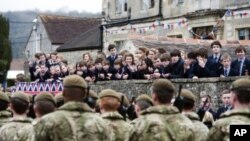 Yorkshire Regiment (3 YORKS) march past during a pre-deployment parade in Warminster, in Wiltshire, March 16, 2012. 