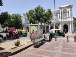 Auto rickshaw drivers don't see too many customers as most people still hesitate to venture outside. (Anjana Pasricha/VOA)
