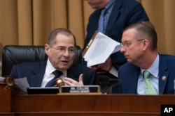 FILE - House Judiciary Committee Chair Jerrold Nadler, D-N.Y., left, and Rep. Doug Collins, R-Ga., the ranking member, talk as Nadler moves ahead with a vote to hold Attorney General William Barr in contempt of Congress on May 8, 2019. (AP Photo)