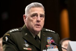 FILE - Chairman of the Joint Chiefs of Staff Gen. Mark Milley testifies to Senate Armed Services Committee on Capitol Hill, March 4, 2020.