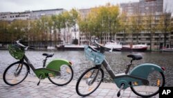The new "Velib Metropole" bicycle, which is a bike-sharing program by the Smovengo consortium is seen during a media presentation in Paris, Oct. 25, 2017.