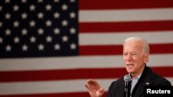 Democratic 2020 U.S. presidential candidate and former U.S. Vice President Joe Biden speaks during a town hall meeting, during his "No Malarkey!" campaign bus tour at Iowa State University in Ames, Iowa, Dec. 4, 2019. 