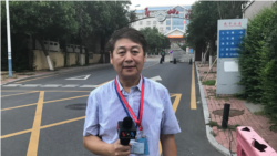 美国政界、人权组织和活动人士谴责中国当局扣押VOA记者