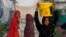 A woman carries water for her family at a tube well in Rawalpindi, Pakistan, Aug. 22, 2017. A new study suggests some 50 million Pakistanis could be at risk of drinking arsenic-tainted groundwater. The findings are based on a hazard map built using water quality data from 1,200 tube wells in the densely populated Indus Valley.