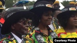 President Robert Mugabe, his wife Grace, daughter Bona and other family members.